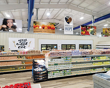 Clients shop food pantry much like typical grocery store