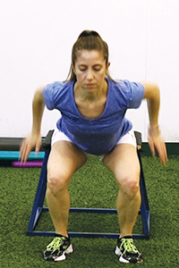 Woman demonstrates proper alignment to prevent knee injury