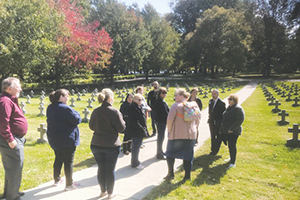 Employees of HSHS tour a cemetery