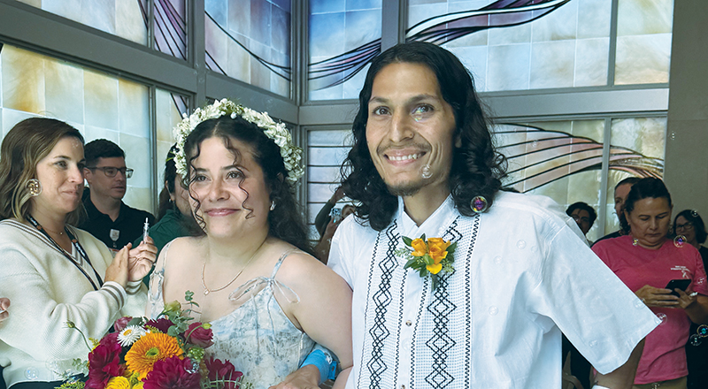 A man and woman getting married.