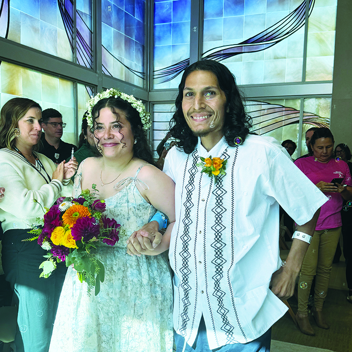 A man and woman getting married.